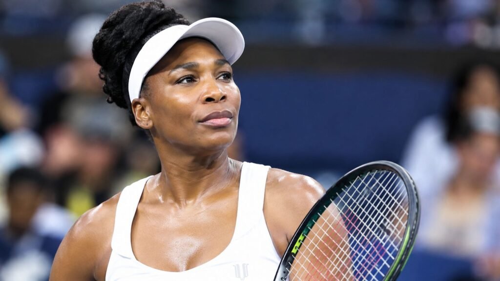 How Old Is Venus Williams? Age, Career Milestones, and 2026 US Open How old is Venus Williams? Venus Williams wearing a white visor and holding a tennis racket on the court.