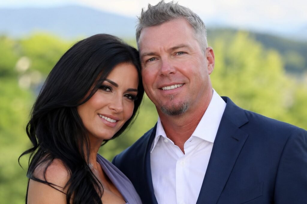 Chipper Jones wife Taylor Higgins posing together outdoors